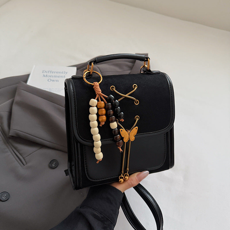 Textured Crossbody Commuter Backpack
