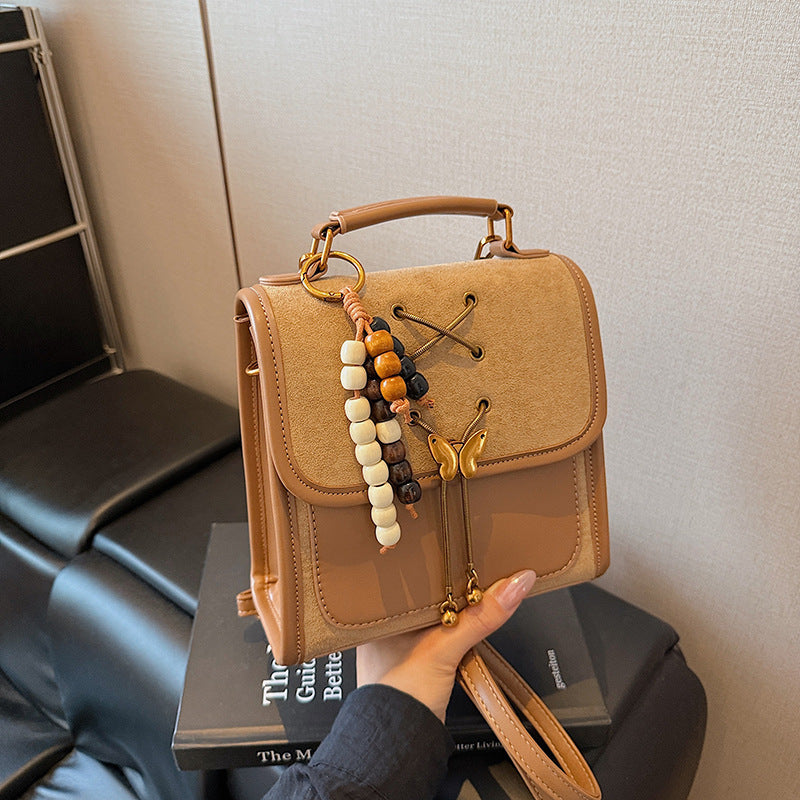 Textured Crossbody Commuter Backpack