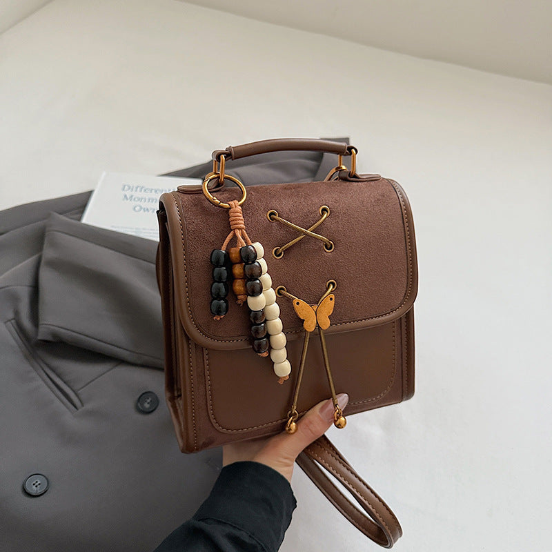 Textured Crossbody Commuter Backpack
