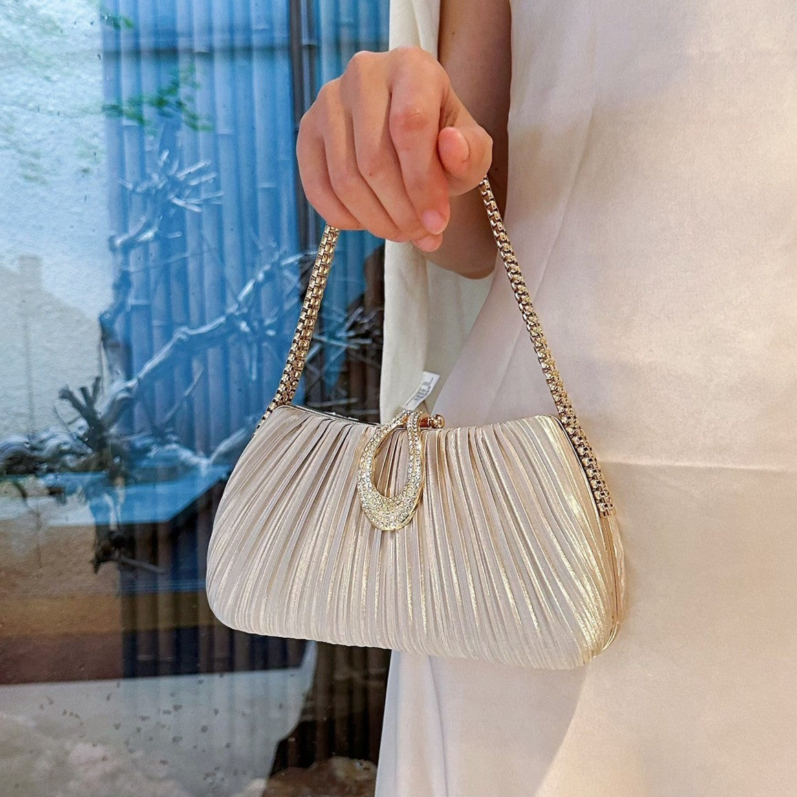 A New Satin Pleated Evening Bag