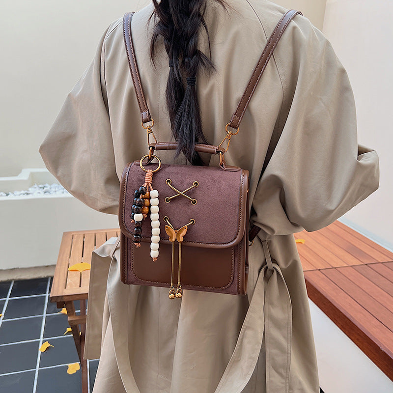 Textured Crossbody Commuter Backpack