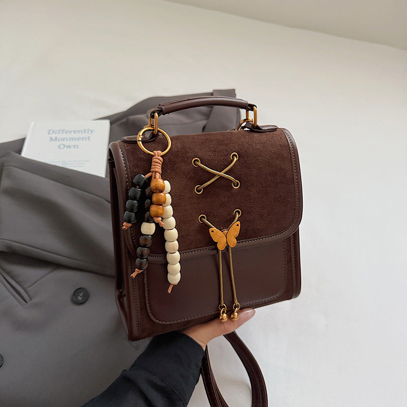 Textured Crossbody Commuter Backpack