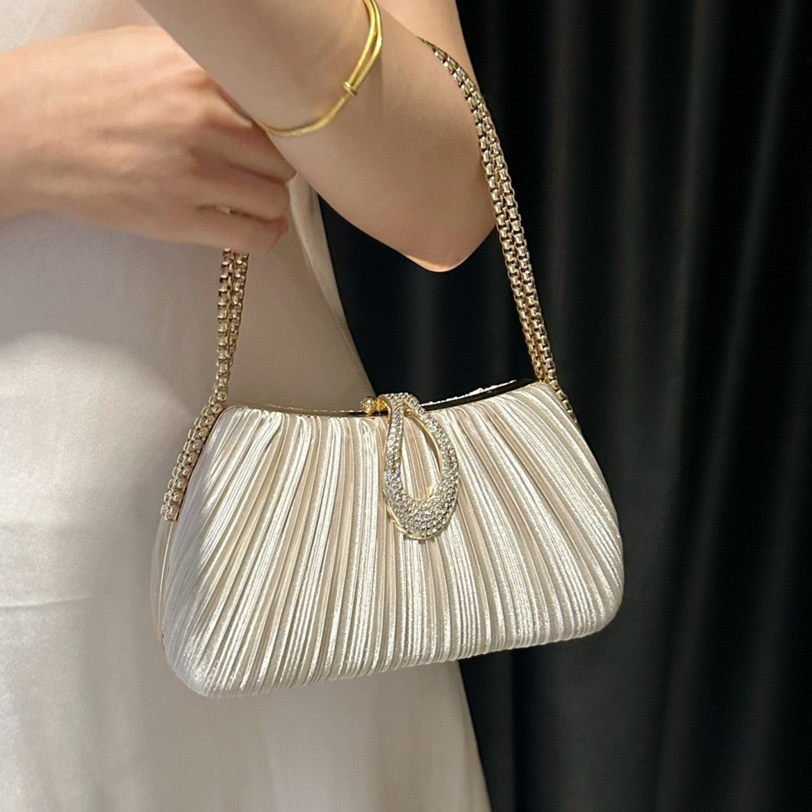 A New Satin Pleated Evening Bag