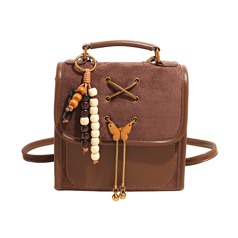 Textured Crossbody Commuter Backpack