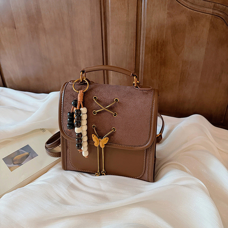 Textured Crossbody Commuter Backpack